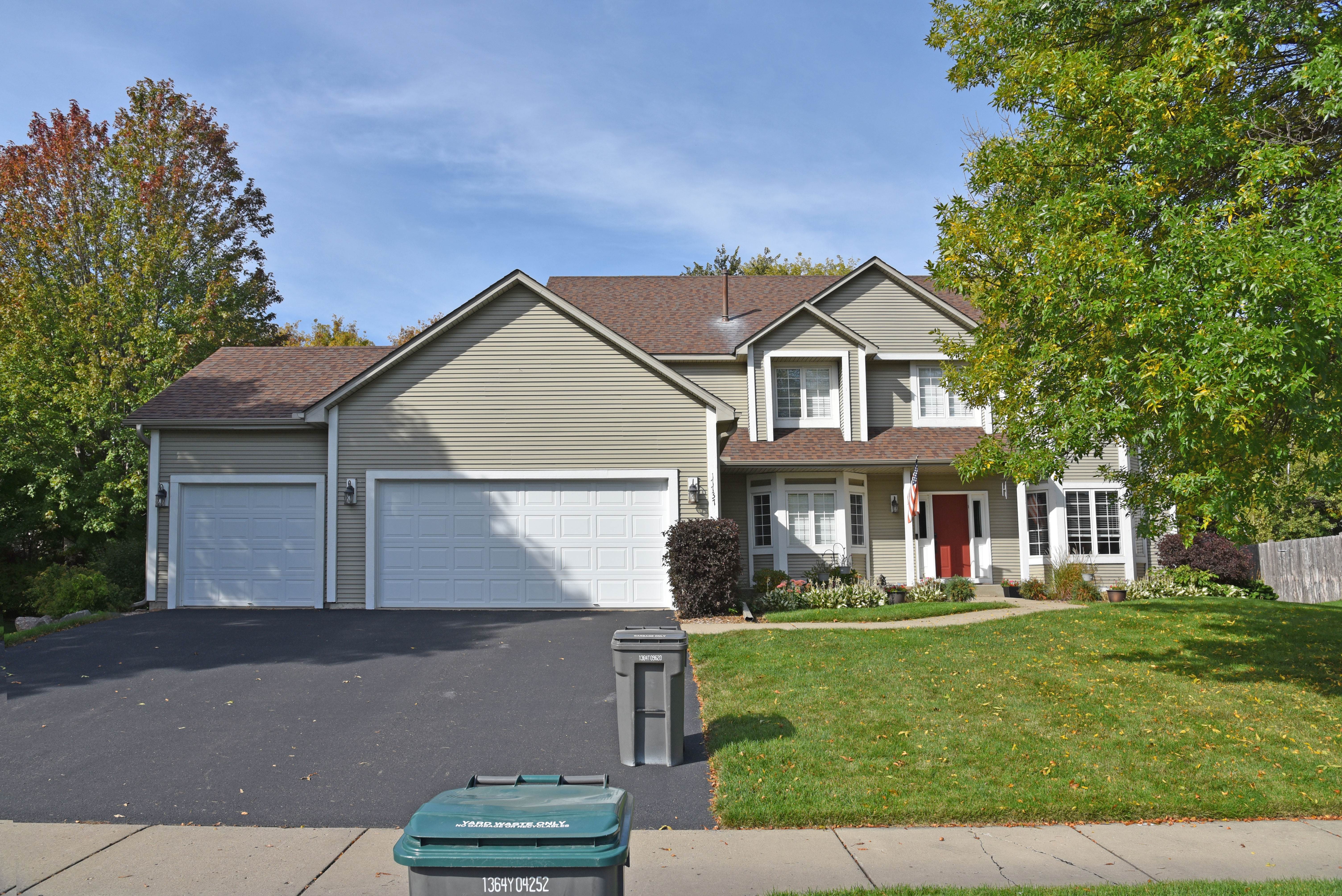 Original home exterior before Jensen Remodel Design transformation